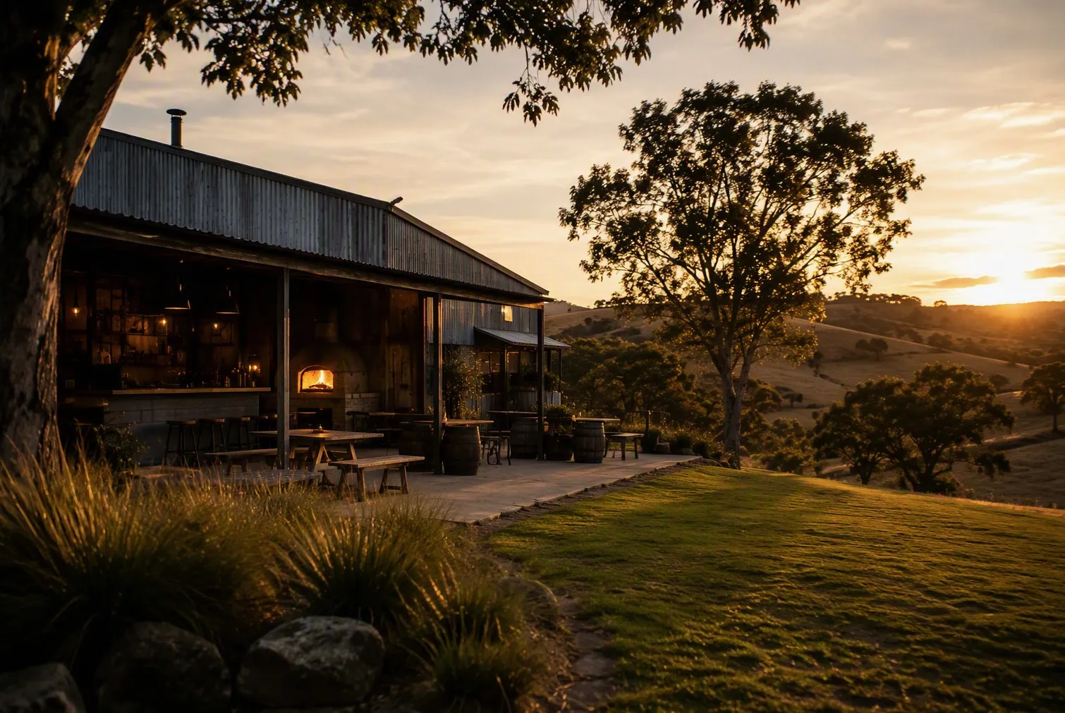 A long timber table outside a corrugated-iron shed.